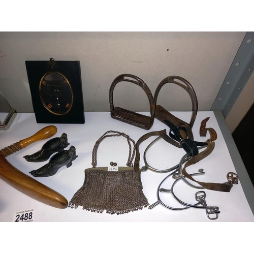 2488 - A shelf of collectables including spurs, mesh purse & shoe pin cushions etc