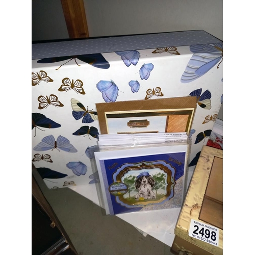 2498 - A quantity of boxes, new celebration & Christmas cards