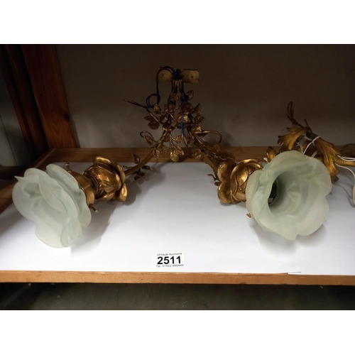 2511 - A pair of ormolu wall lights together with a twin ormolu wall light. COLLECT ONLY