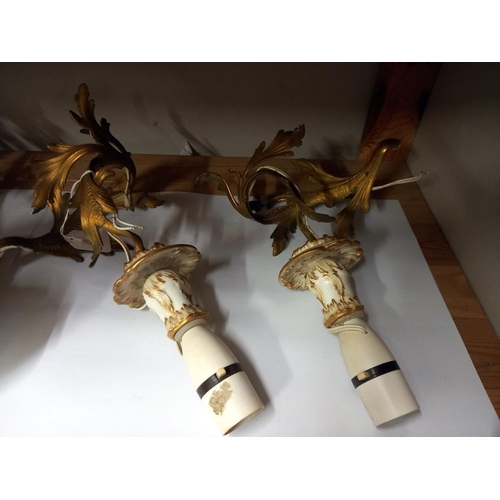 2511 - A pair of ormolu wall lights together with a twin ormolu wall light. COLLECT ONLY