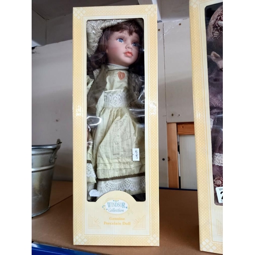 2522 - 3 boxed porcelain Dolls COLLECT ONLY