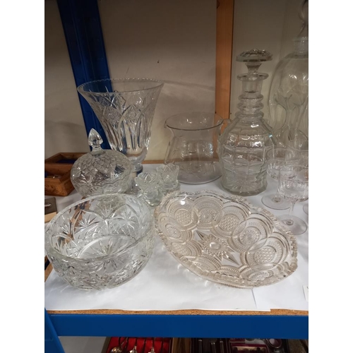 2524 - A shelf of glass including bowls & decanters etc. COLLECT ONLY