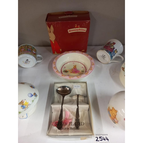 2544 - A shelf of baby pottery including Royal Doulton Bunnykins etc. COLLECT ONLY