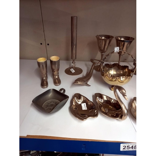 2548 - A quantity of silver plate including goblets & swan graduated ashtrays etc