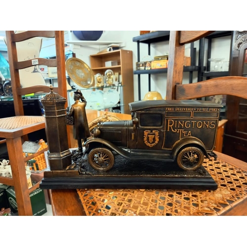 2559 - A boxed Ringtons tea & more to your door bronzed resin model of a delivery van