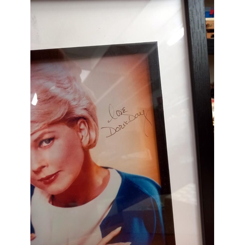 2597 - A signed framed and glazed picture of Doris Day with certificate COLLECT ONLY