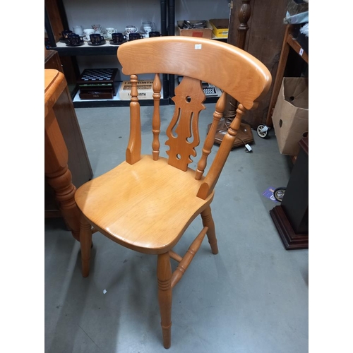 2600 - A pine kitchen table and 2 chairs COLLECT ONLY