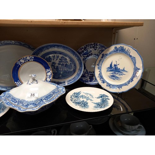 35 - A good lot of blue & white plates including Royal Doulton & Wedgwood COLLECT ONLY