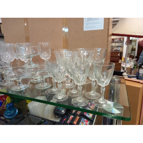 2633 - A good lot of drinking glasses and dessert bowls. Collect Only