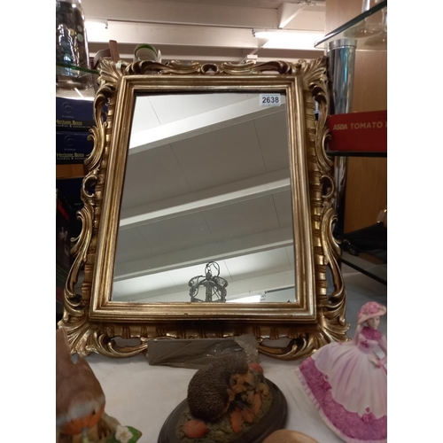 2638 - A gilt Ormolu framed mirror 44cm x 55cm. Collect only