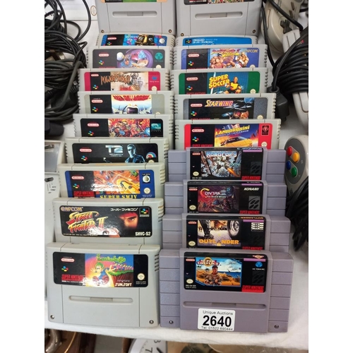 2640 - A Super Nintendo console, boxed Scope 6 and quantity of games etc.  Collect Only