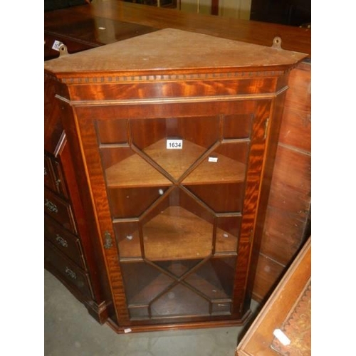 1634 - A mahogany astragal glazed corner cabinet COLLECT ONLY.