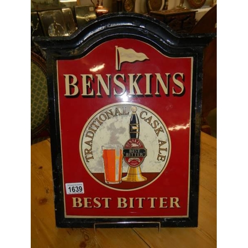 1639 - An old Benskins Best Bitter enamel sign in cast metal wall mount with wooden backing, COLLECT ONLY.