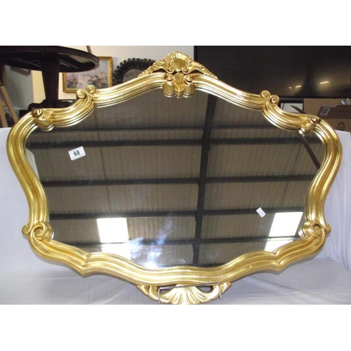 68 - An ornate gilt ormalu framed mirror COLLECT ONLY