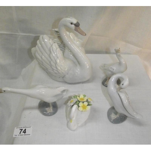 74 - 4 Lladro ornaments including large Swan plus Royal Doulton example