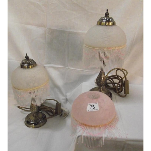 75 - A pair of table lamps with beaded glass shades and a spare beaded shade