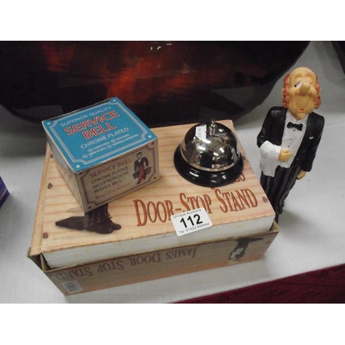 112 - A novelty butler door stop and service bell, both with boxes