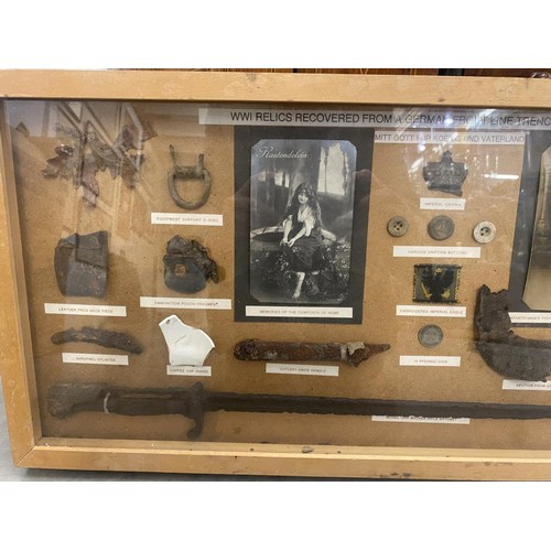 1030D - A framed WW1 display of Relics From a German Line Trench from Ypres Salient