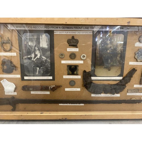 1030D - A framed WW1 display of Relics From a German Line Trench from Ypres Salient