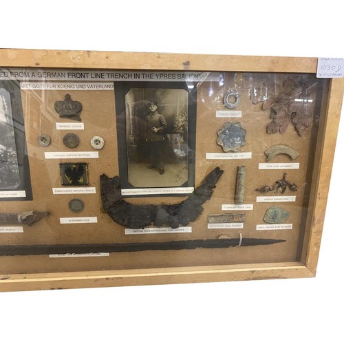 1030D - A framed WW1 display of Relics From a German Line Trench from Ypres Salient