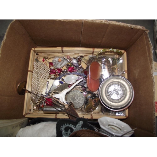 144 - A box of beads, badges, brooches, chains etc plus photographs and ephemera