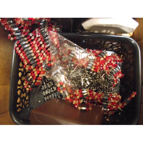 144 - A box of beads, badges, brooches, chains etc plus photographs and ephemera