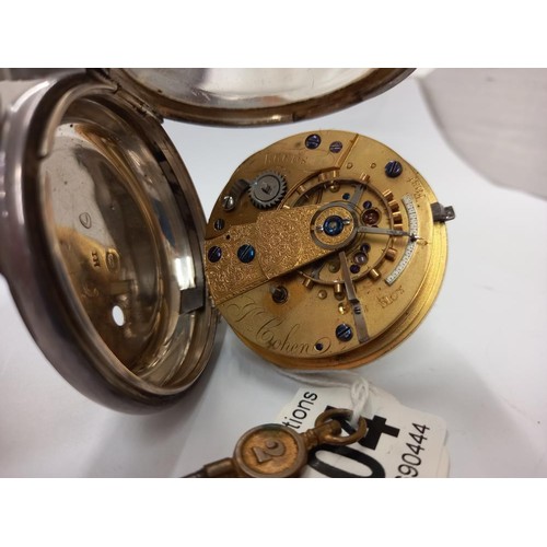 1004 - A silver pocket watch with key, dial cracked and not working.