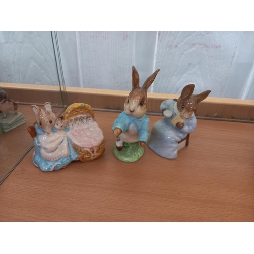 189 - A quantity of Beswick and Royal Albert Beatrix Potter figurines