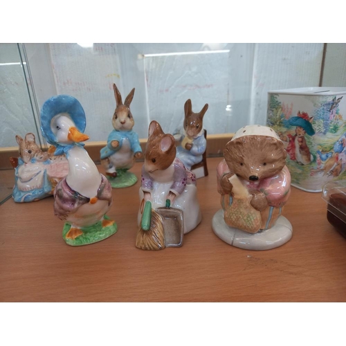 189 - A quantity of Beswick and Royal Albert Beatrix Potter figurines