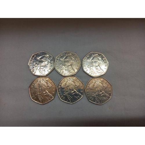 190 - A quantity of Beatrix Potter 50p coins (approximately £11.50) 2 money boxes and magnets