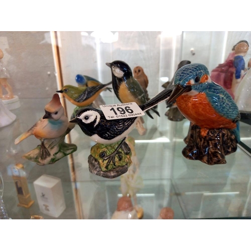 196 - A quantity of bird figurines including Mack etc