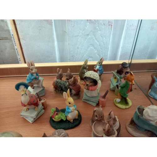 200 - A quantity of figures of Beatrix Potter characters