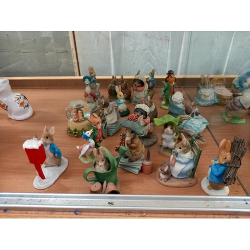 200 - A quantity of figures of Beatrix Potter characters