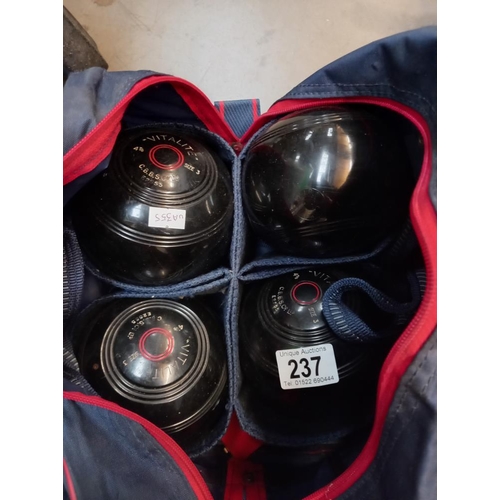 237 - 8 lawn bowls in carry case (various bowl sizes) COLLECT ONLY