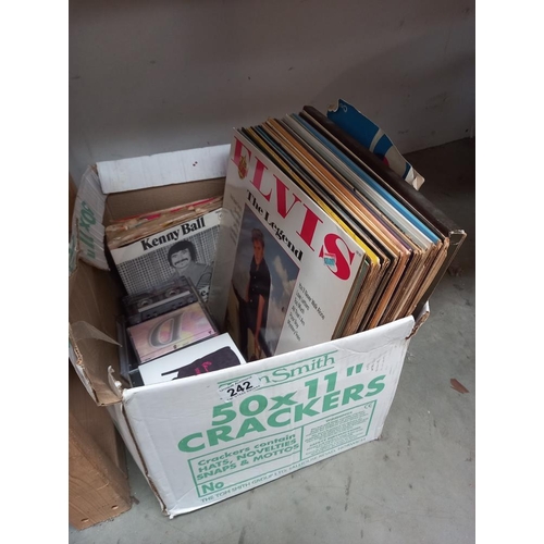 242 - A box of LP's, singles & cassettes COLLECT ONLY