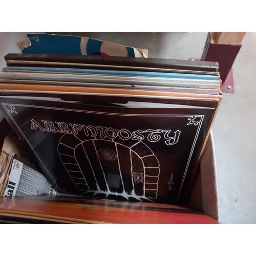 242 - A box of LP's, singles & cassettes COLLECT ONLY