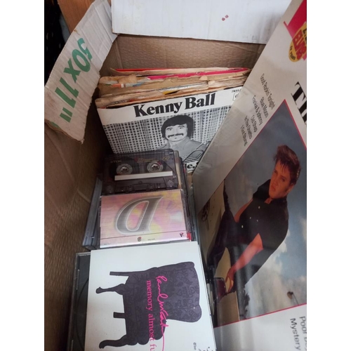 242 - A box of LP's, singles & cassettes COLLECT ONLY