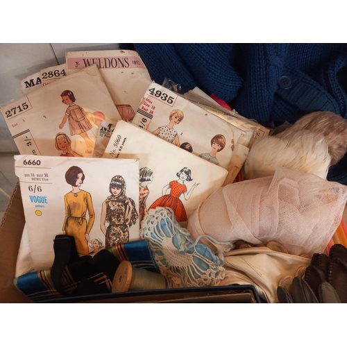 254 - A box of linen, sewing items, buttons, sewing patterns & gloves etc. COLLECT ONLY