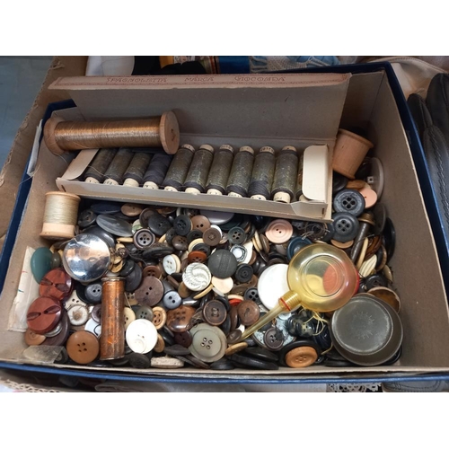 254 - A box of linen, sewing items, buttons, sewing patterns & gloves etc. COLLECT ONLY