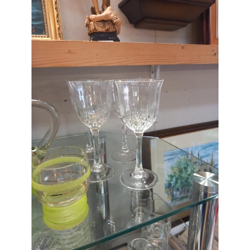 260 - A quantity of drinking glasses & a partial summer drinks set (2 shelves) COLLECT ONLY