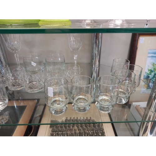 260 - A quantity of drinking glasses & a partial summer drinks set (2 shelves) COLLECT ONLY