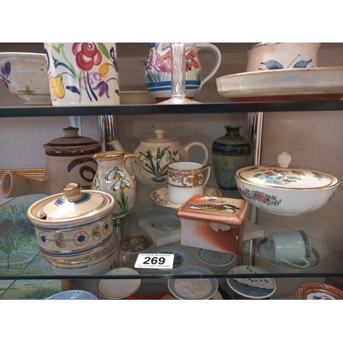 269 - A quantity of small porcelain plates, stoneware pots & vases etc. (3 shelves) COLLECT ONLY