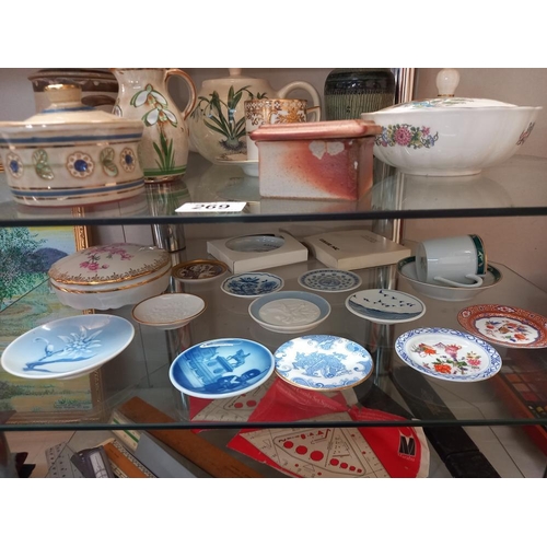 269 - A quantity of small porcelain plates, stoneware pots & vases etc. (3 shelves) COLLECT ONLY