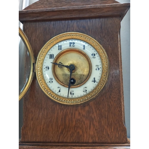 276 - An Edwardian oak mantle clock COLLECT ONLY