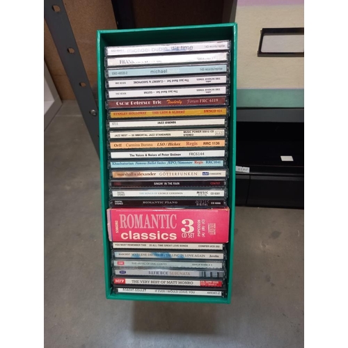 306 - A good quantity of music CDs and cassettes Collect only