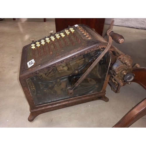 325 - A large early Burroughs adding machine with bevelled glass viewing panels Collect only