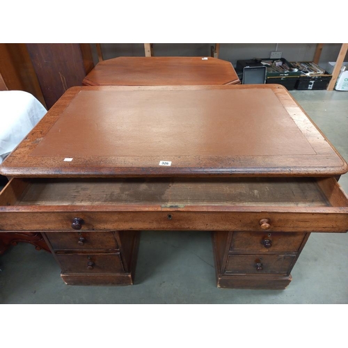 326 - An oak pedestal writing desk with brown leatherette top. COLLECT ONLY.