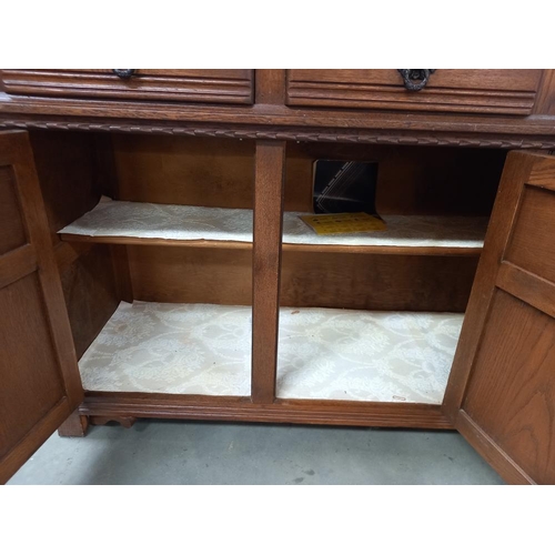 327 - A 1930's oak buffet with lead glazed doors, COLLECT ONLY.