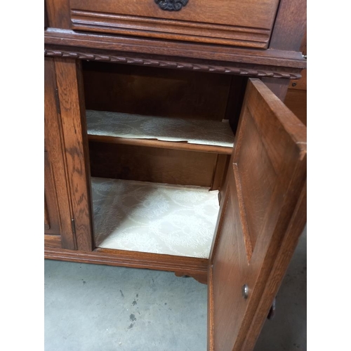 327 - A 1930's oak buffet with lead glazed doors, COLLECT ONLY.