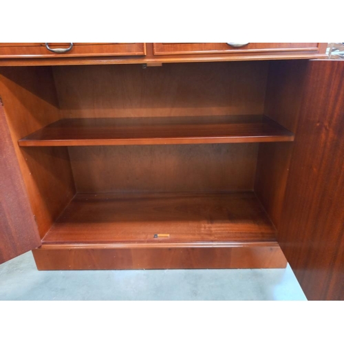 352 - A darkwood stained bookcase/display cabinet with cupboard. COLLECT ONLY.